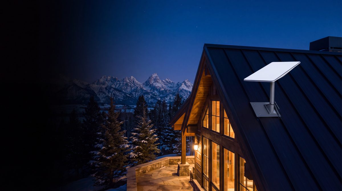 A cleanly mounted Starlink dish on a standing-seam metal roof