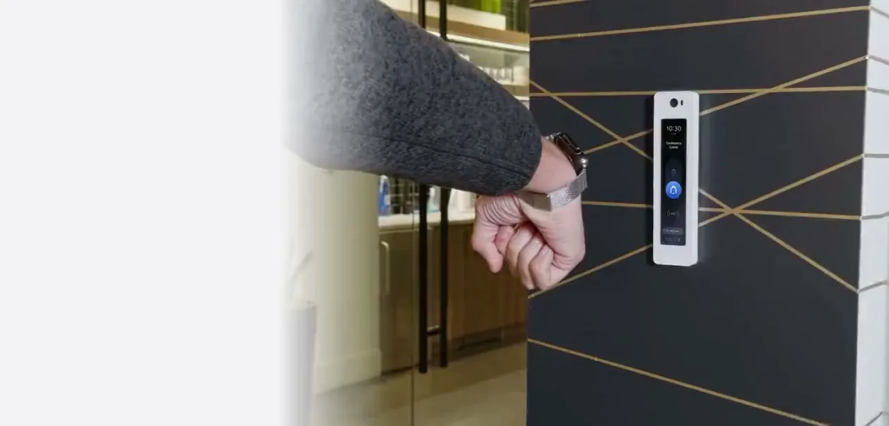 UniFi Access reader unlocking a door with a phone tap