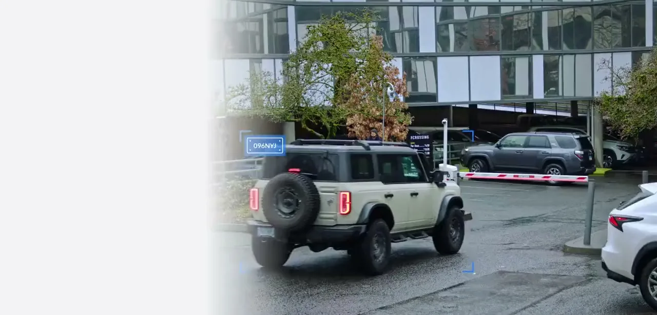 UniFi AI camera reading a licence plate and describing a vehicle at an intersection